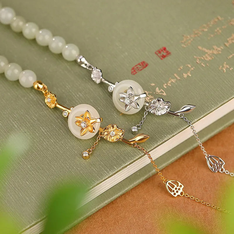 Women's retro bracelet with Hetian jade lotus peace buckle design in 925 silver