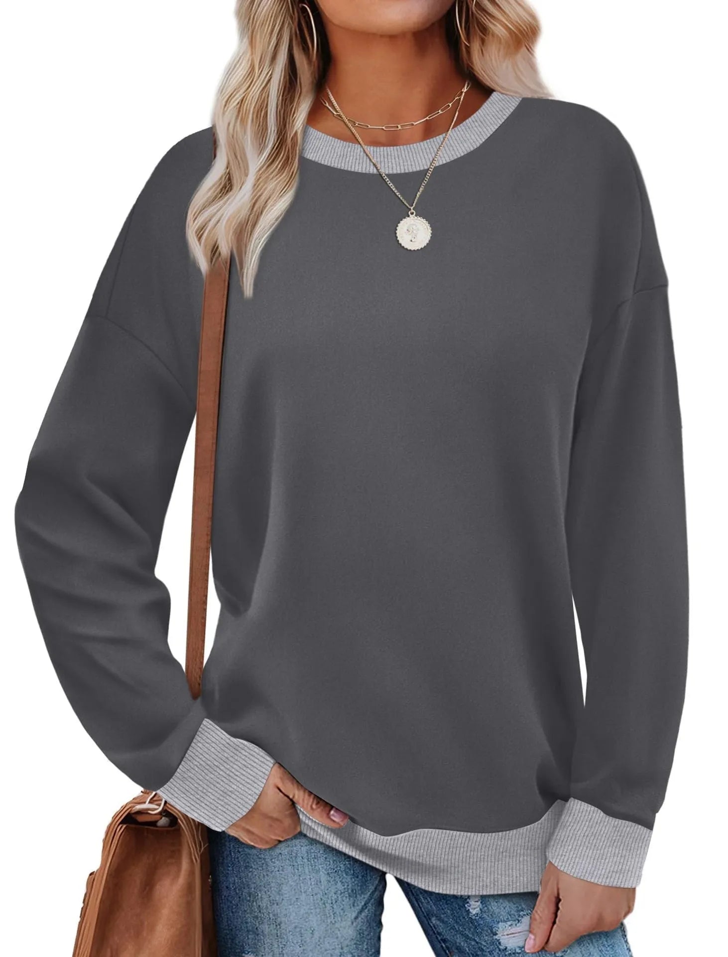 Women's loose striped long sleeve top in apricot colour on hanger
