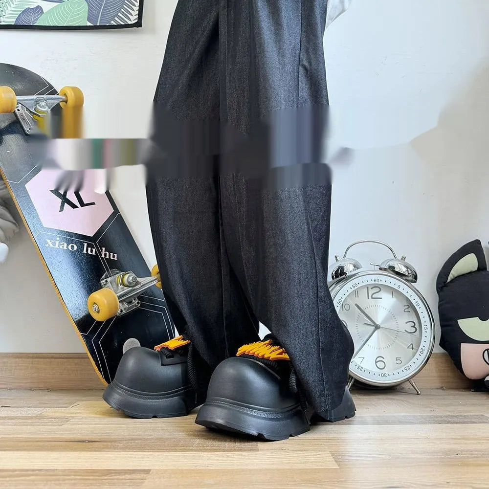 Black casual shoes with a thick EVA sole for height increase, shown from a side angle.