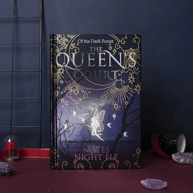 Blue and purple luminous hardcover A5 notebook with full-colour illustrated pages open.