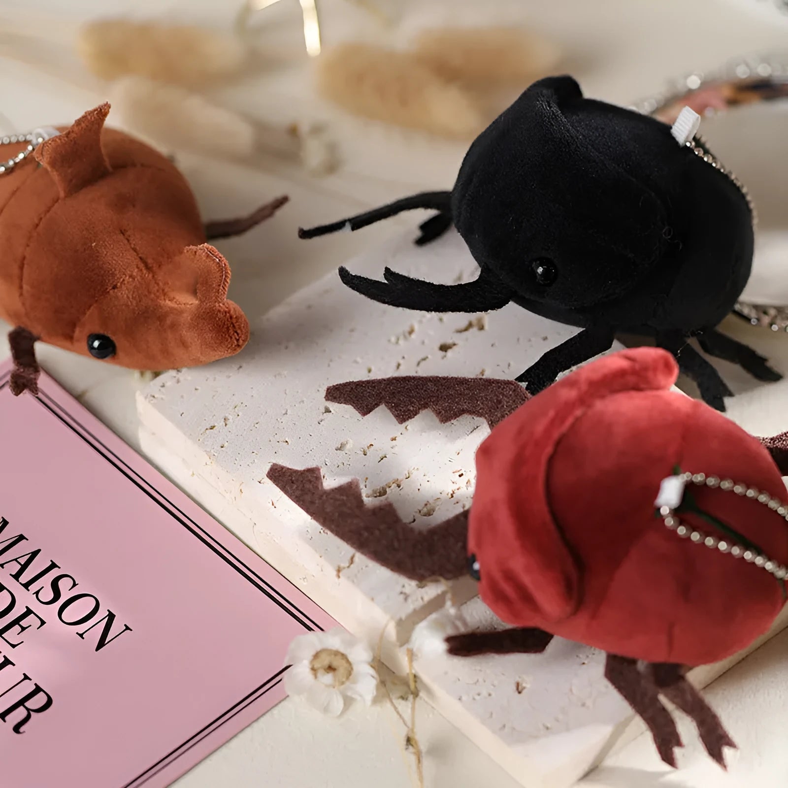 Small black plush Beetle Doll pendant shaped like a Japanese rhinoceros beetle, 10cm tall.