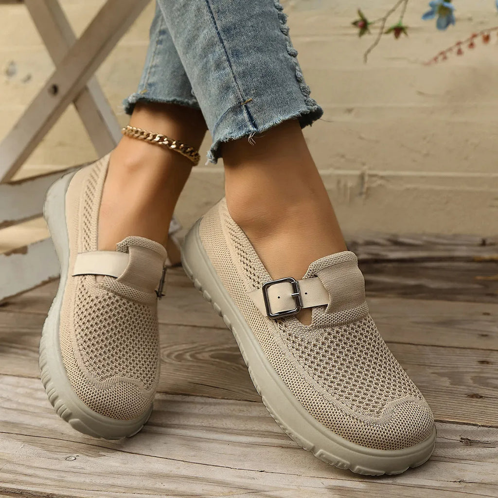 Slip-on sneaker with Flyknit upper, mid-top wedge heel, available in beige, black, brown