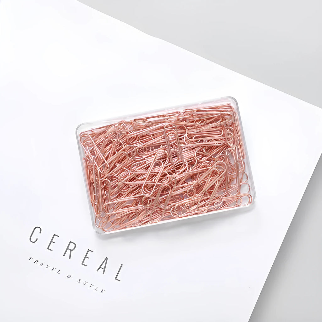 Rose gold coloured heart-shaped metal paper clips, pack of 100 pieces.