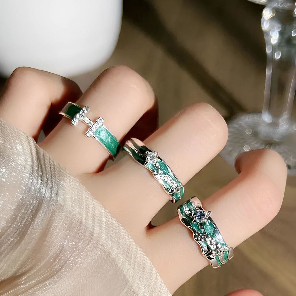 Mint green enamel copper ring with asymmetric folding design and asterism star motif