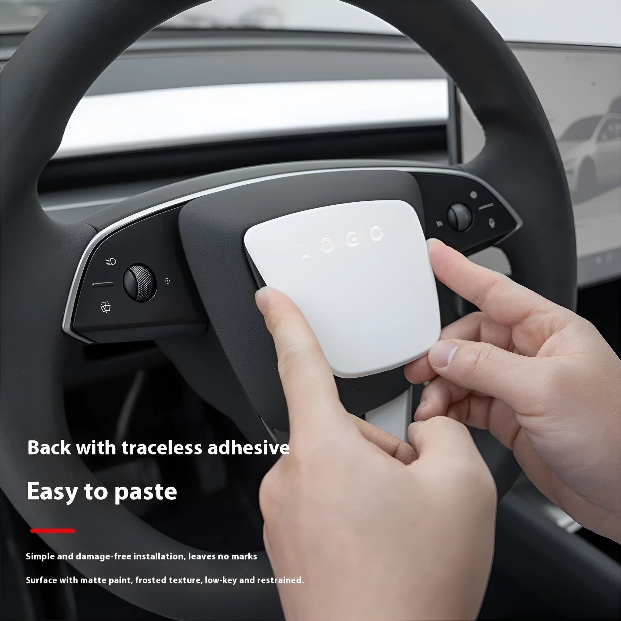 White plastic steering wheel protective patch on a car steering wheel.