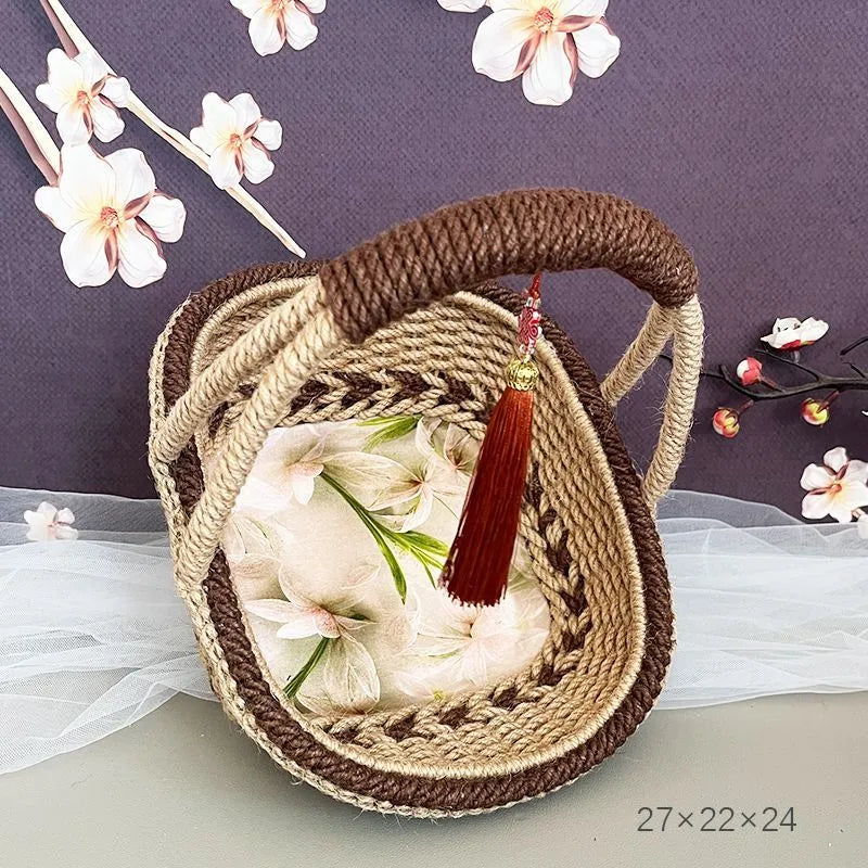 Hand-woven straw basket with hemp rope finish in pastoral retro style