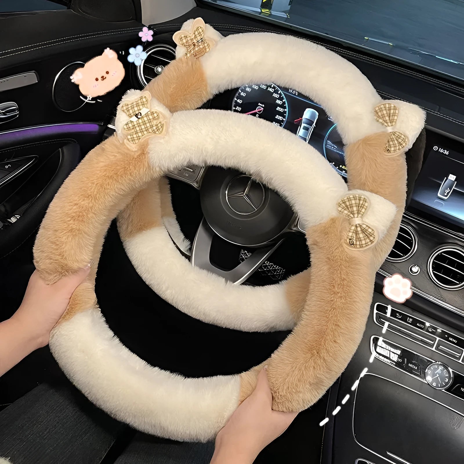 Milk tea white plush steering wheel cover with cute panda ears design on a car steering wheel