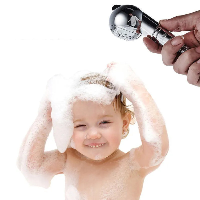 Silver handheld pet shower head with gentle non-pressurised spray for washing dogs and babies.