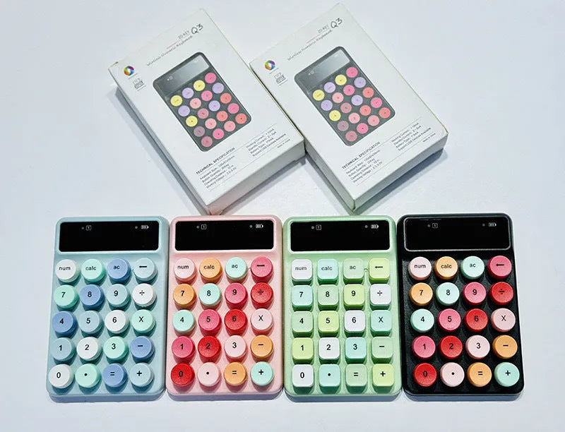 Q3 wireless mini keyboard in Macaron colours on desk