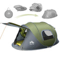 Dark green automatic pop-up two-person camping tent with waterproof rainfly shown in outdoor setting