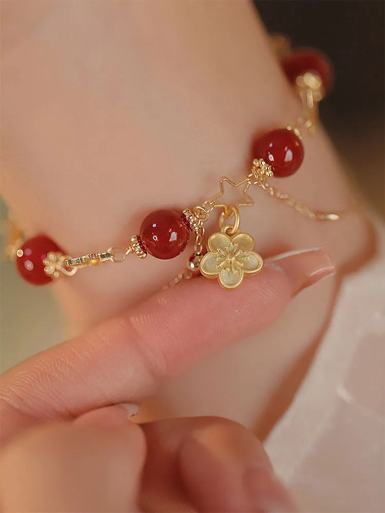 Women's red agate double layer bracelet with peach blossom design and manual processing