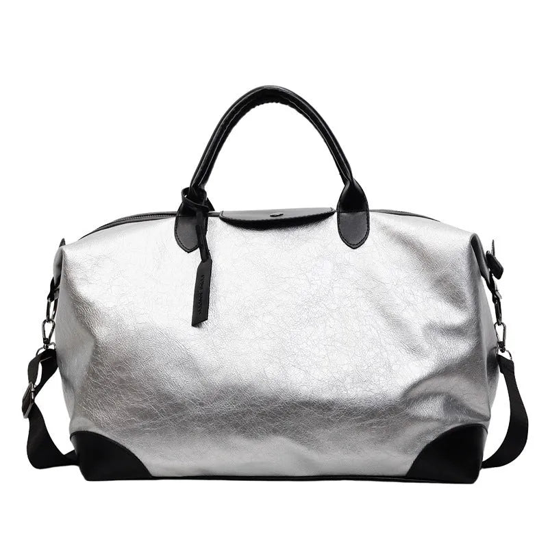 Large hand-carry travel bag for women in black colour showing storage capacity