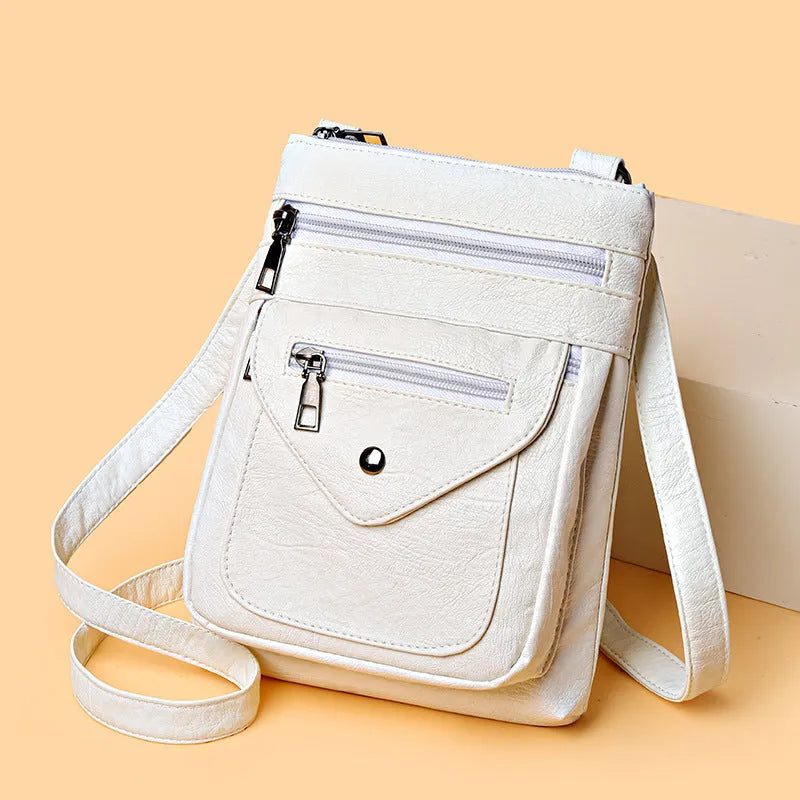 Vertical square-shaped crossbody phone bag in PU leather available in four colours