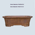 Modern rectangular purple sand floor planter with a visible water level gauge on its side.