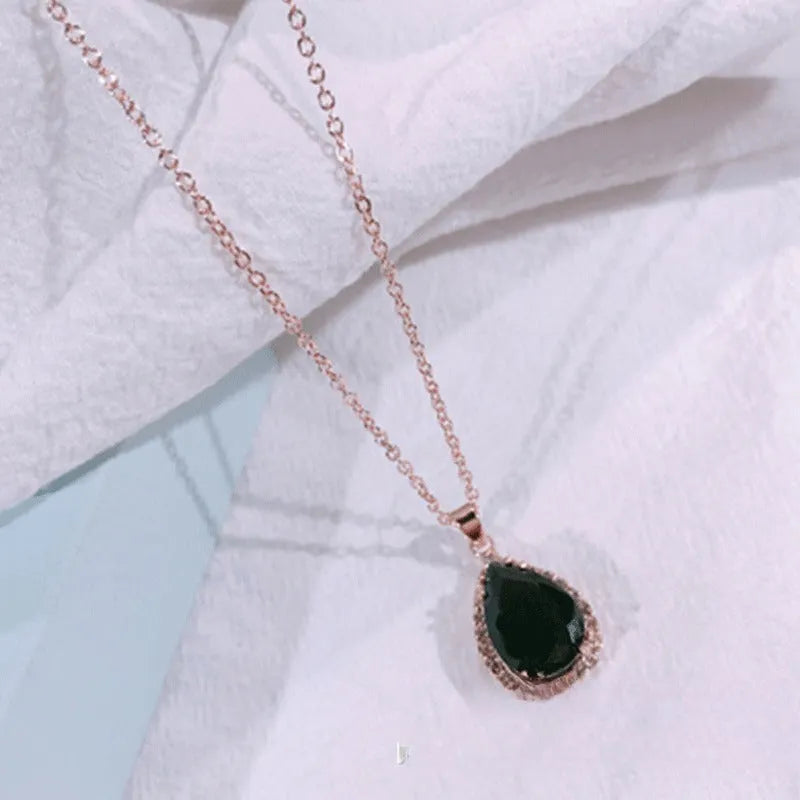 Women's rose gold rhinestone water drop necklace in pink colour with geometric design