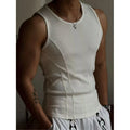 Black men's tight-fitting I-vest tank top with American stitching on a plain background.