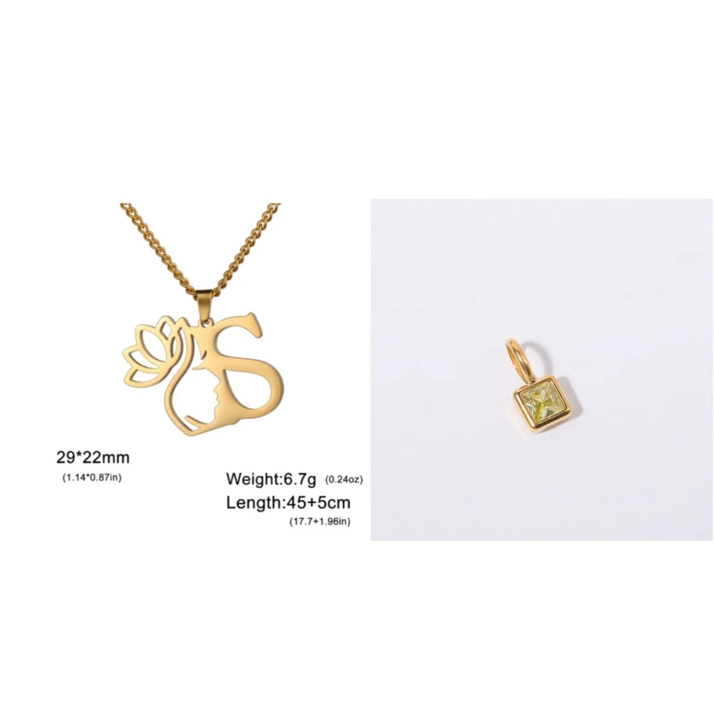 Gold electroplated stainless steel necklace with a cross chain and a letter 'A' pendant on a white background.