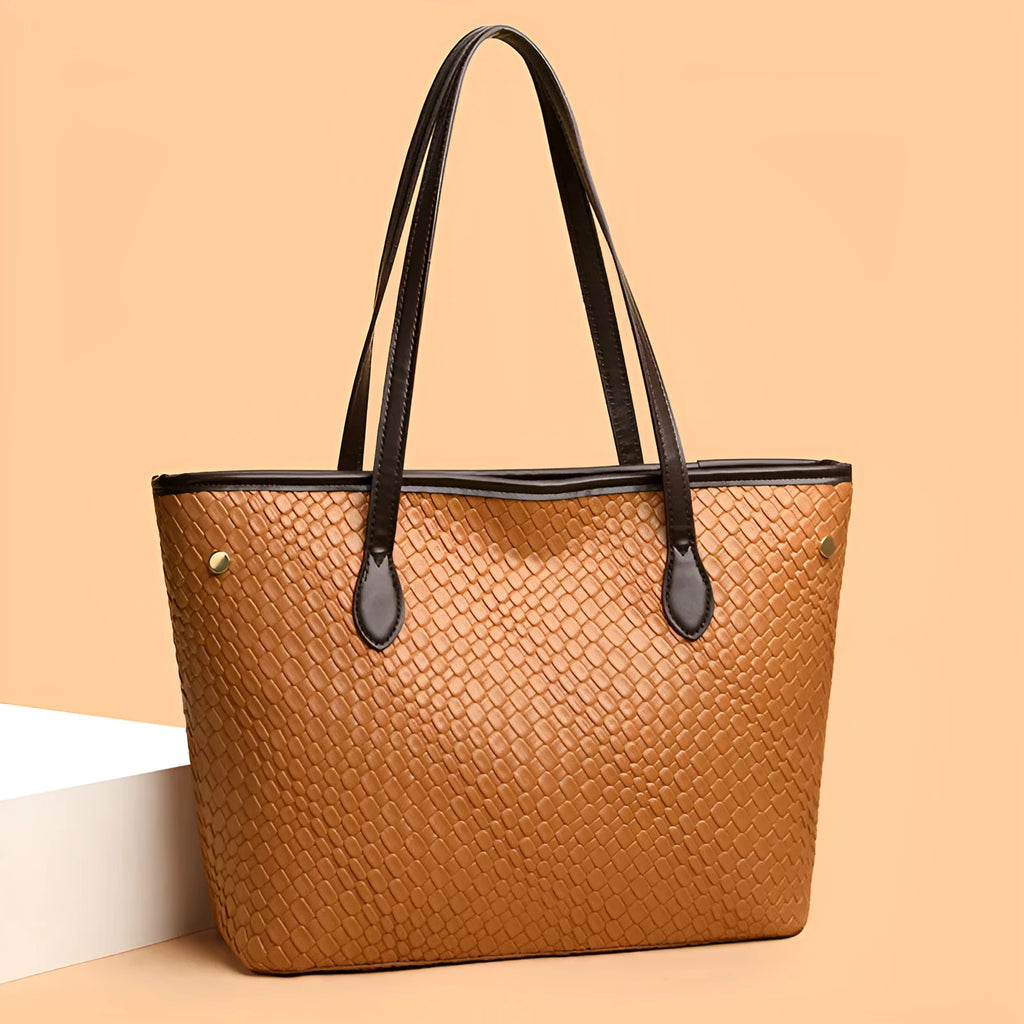 Retro women's large capacity commuter handbag in black or brown with sandwich pocket design