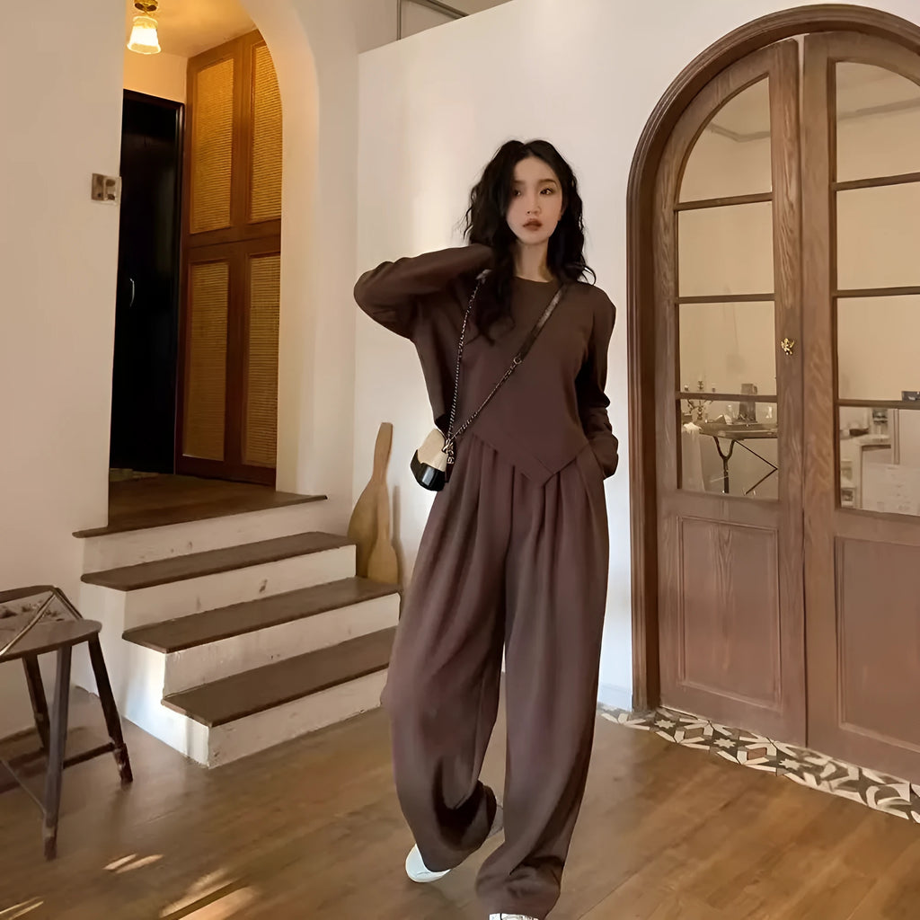 Women's khaki loose-fit casual sports suit with long sleeves and full-length trousers.