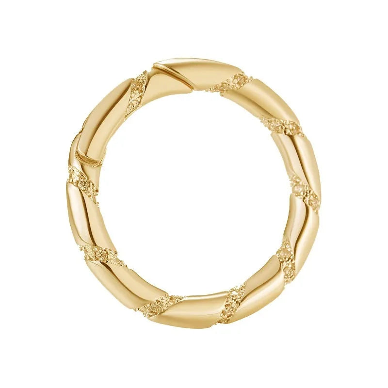 Copper climbing heart button fastener with micro-inlaid zircon stones and gold electroplating.