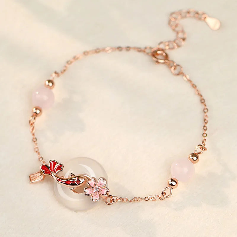 S925 sterling silver bracelet with white chalcedony crystals on a wrist