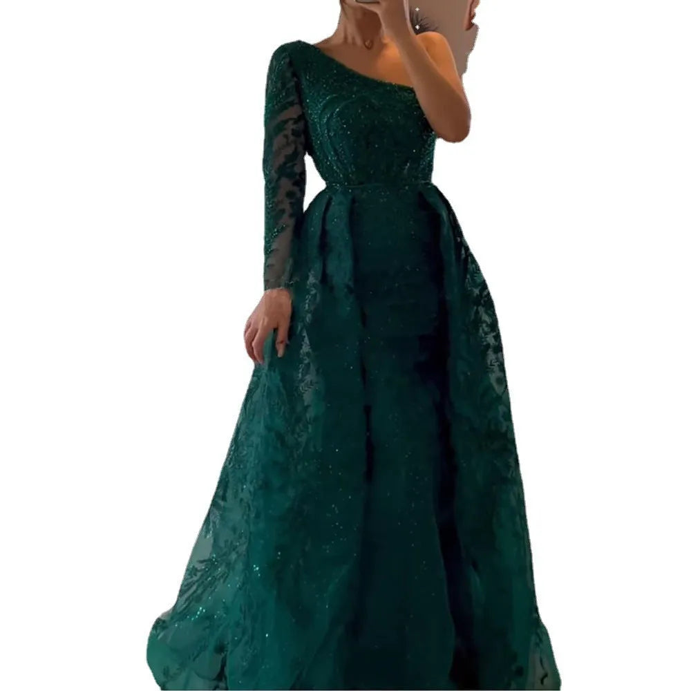 Women's slim-fit fishtail mesh shoulder long-sleeved dress in green with zipper detail on model