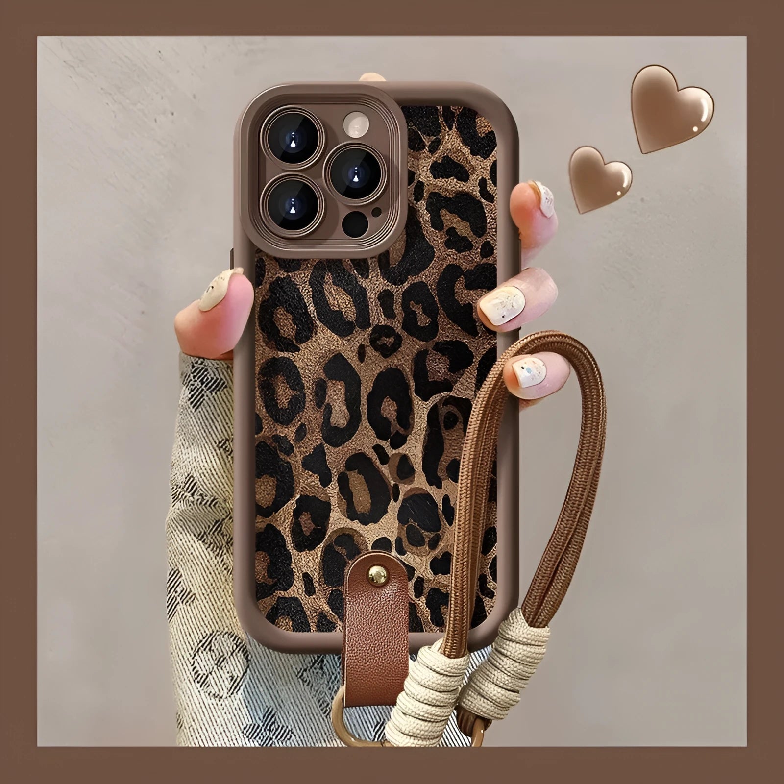 Brown leopard print silicone phone case with attached lanyard for iPhone models