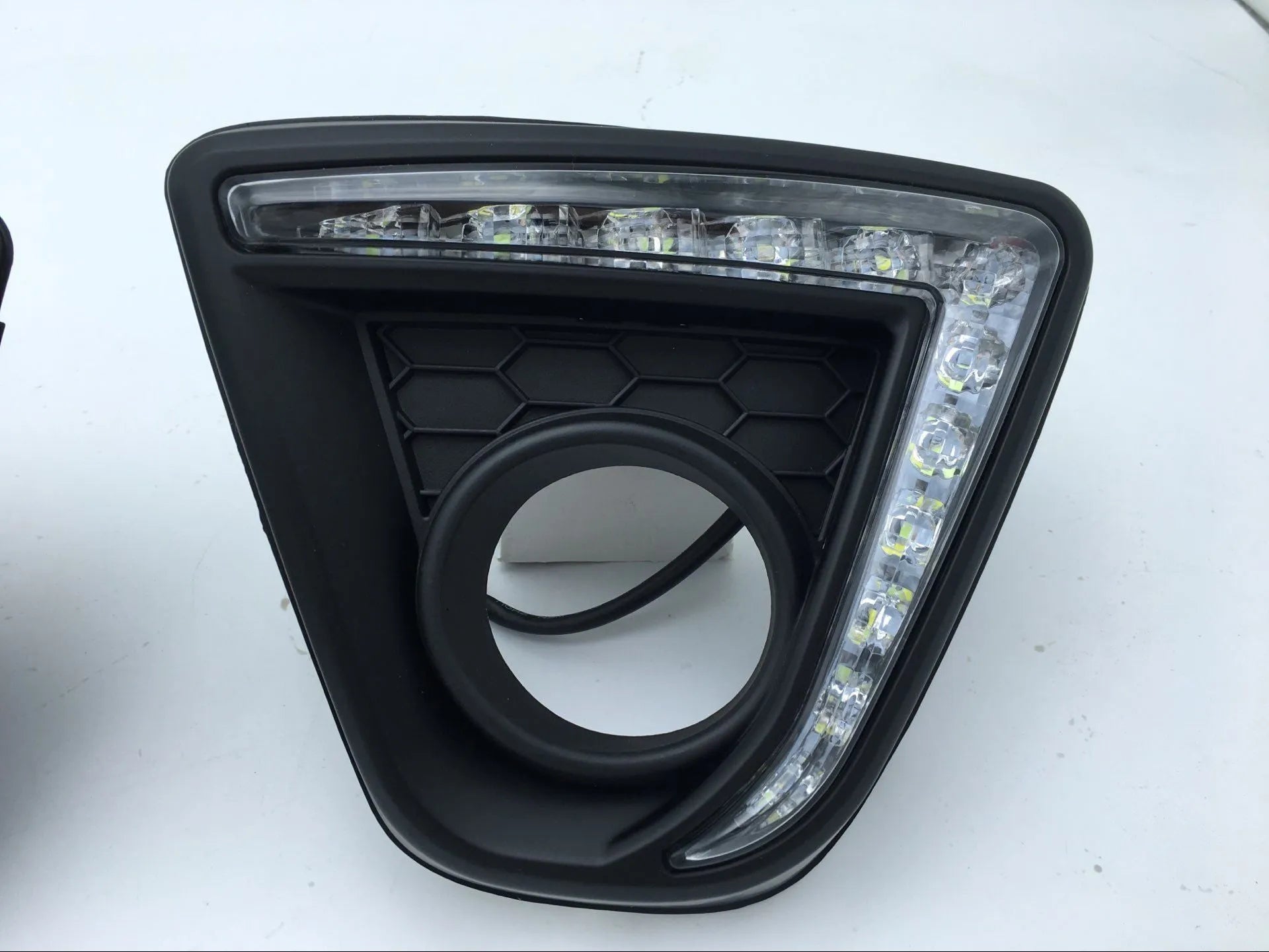 Mazda CX-5 LED daytime running light bulb set with multiple style options on a white background.