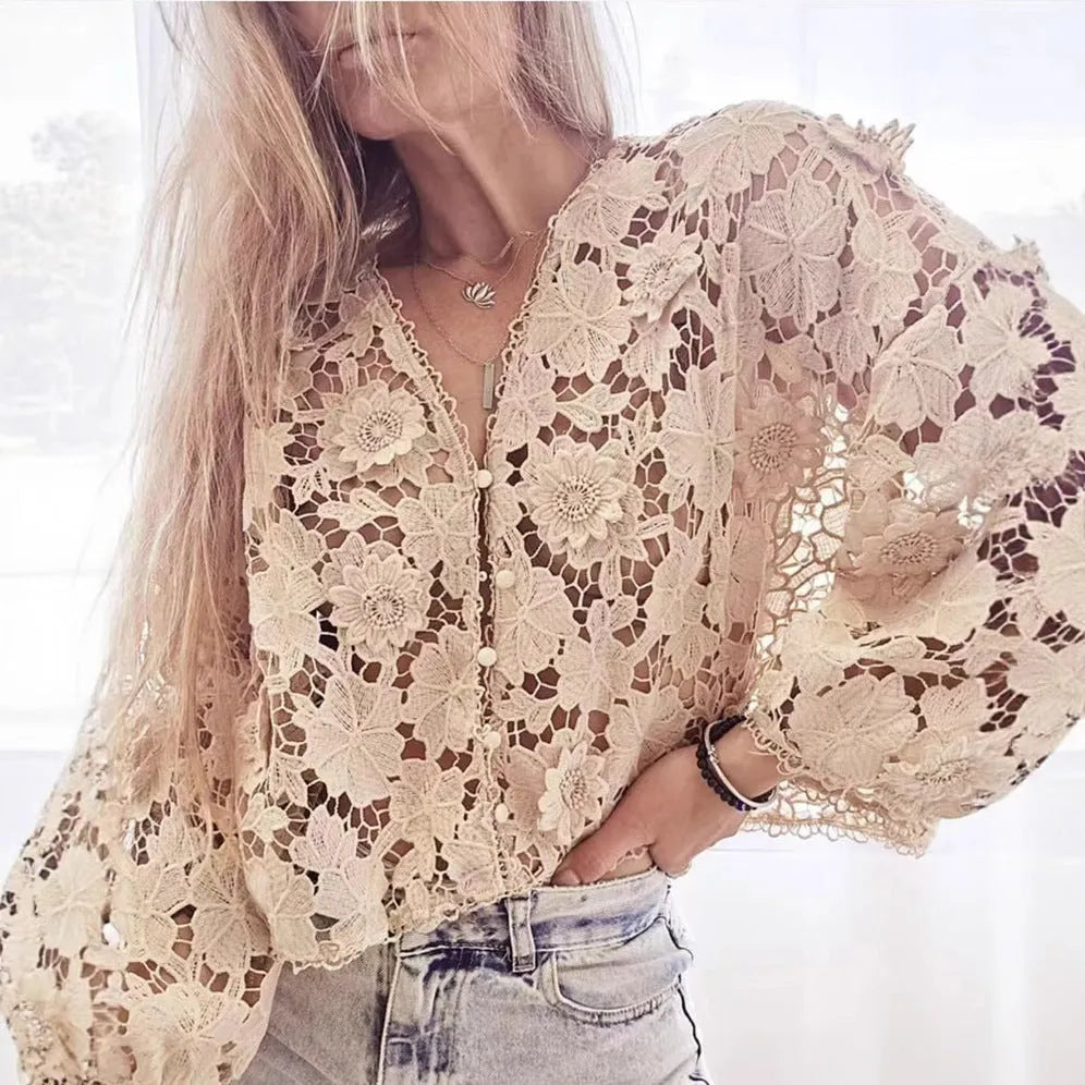 Black loose fit cardigan with white 3D lace floral decoration and a V-neckline