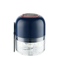 Blue electric garlic masher mini with compact plastic body on kitchen counter