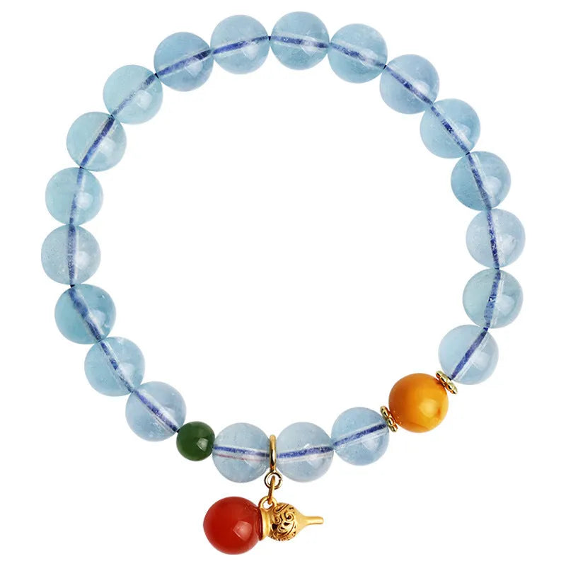 Iced aquamarine crystal bracelet with 8mm geometric beads and retro ethnic styling details