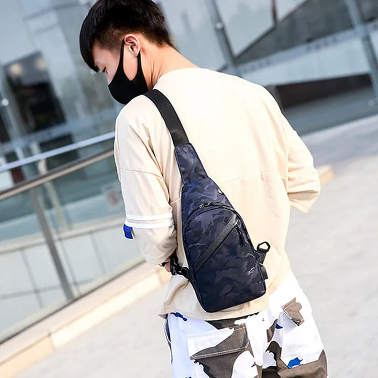 Men's camouflage crossbody chest bag with headphone hole in Camo Black
