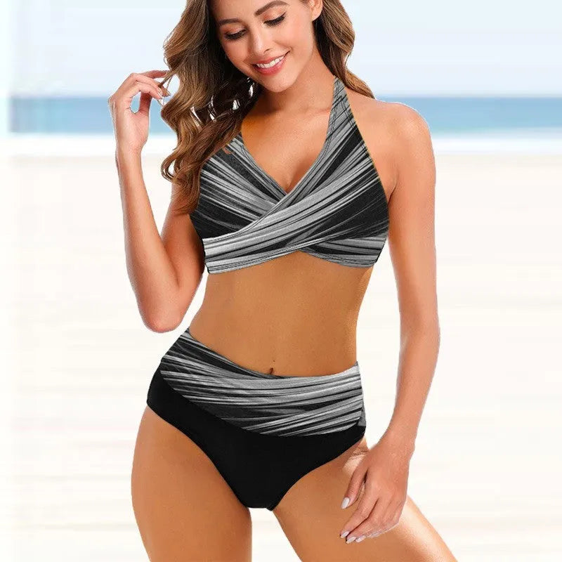 Ladies striped tie-dye bikini set with high-waisted briefs and hollow cut details.