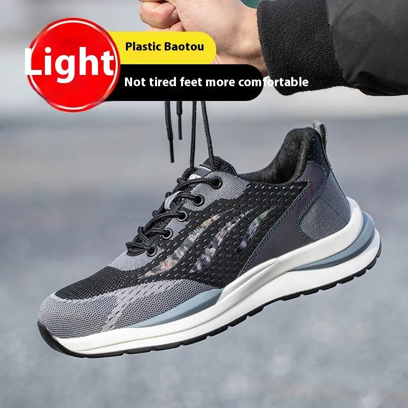 Men's black and grey low-top insulated safety shoes with plastic toe cap and lace-up closure.