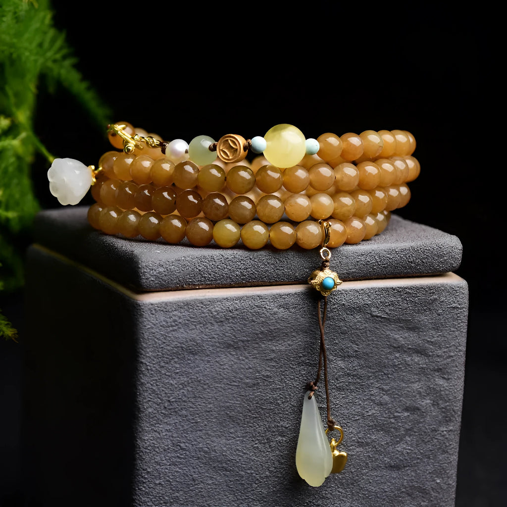 Green pine leaf jade bracelet with 6mm round beads in beeswax clear water colour