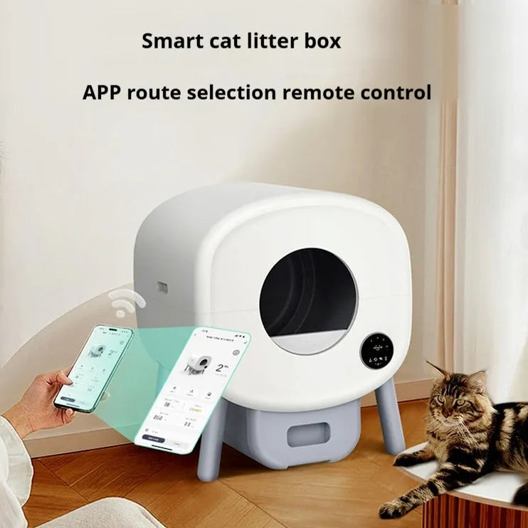 Grey automatic self-cleaning cat litter box with sealed waste drawer, placed on a hardwood floor.