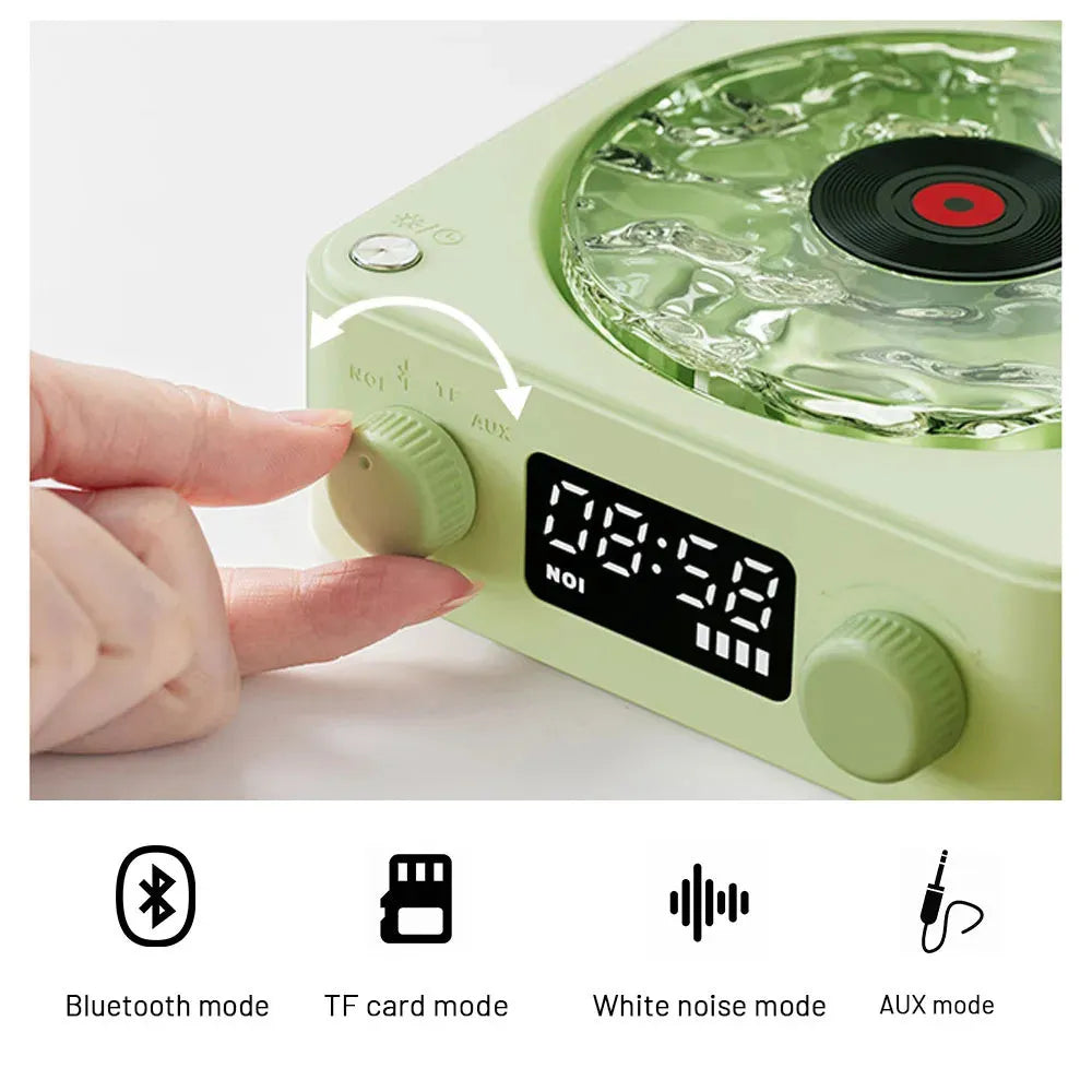 Retro Bluetooth speaker with rotating transparent turntable and RGB projection lighting effects
