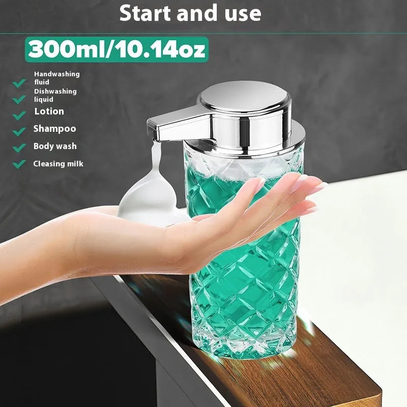 Silver automatic soap dispenser with sensor and USB Type-C charging port on a bathroom countertop