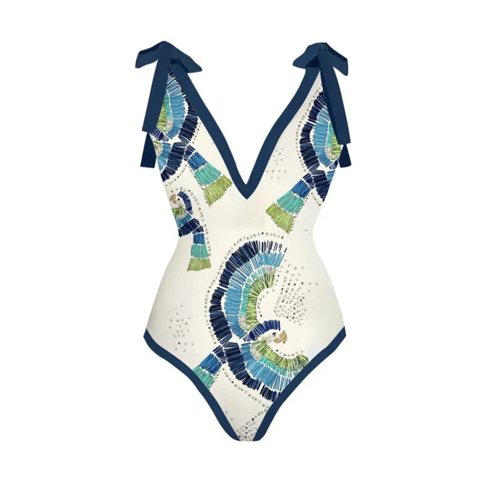 Blue French retro one-piece swimsuit with gauze skirt on a beach setting