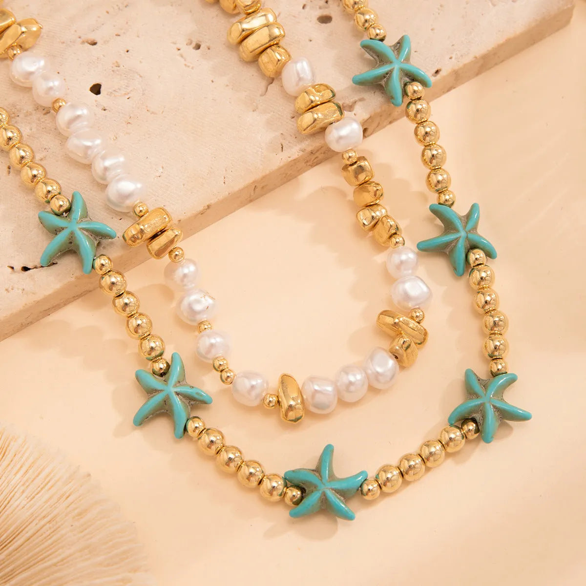 Starfish shell necklace for women, vacation style, ball bead chain, acrylic pendant with five-pointed star and tassel, white colour, set of 2