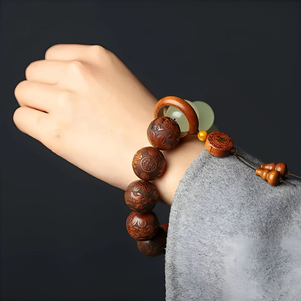 Rosewood bracelet with amass fortunes fu character carving and 20mm wooden beads