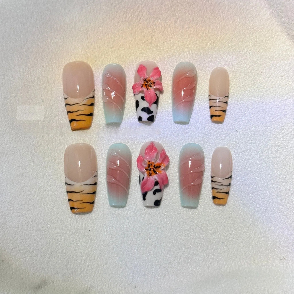 Zebra pattern lily hand carving nail art set showing embossed flower and leopard print designs