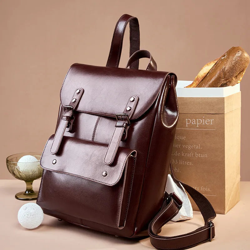 Women's leather computer backpack in black made from two-layer cowhide with hard structure