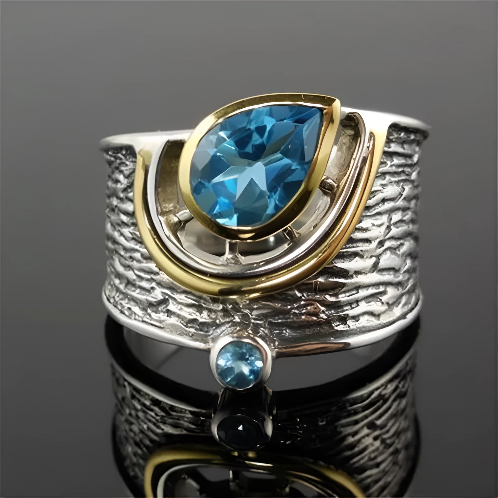 Chinese-style women's ring with blue rhinestones in drop shape design on alloy band