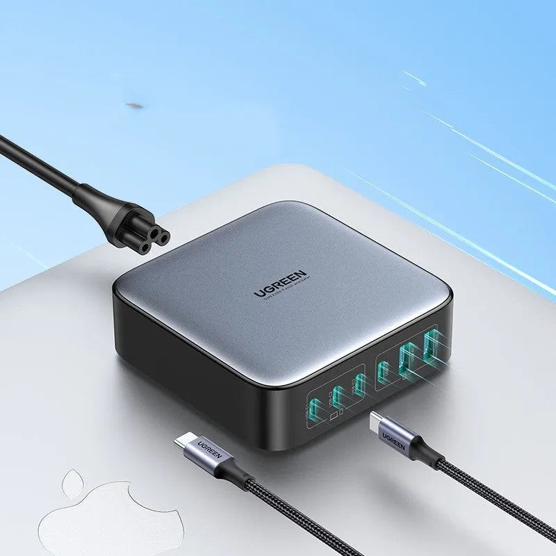 Compact 100W gallium nitride fast charger with Type-C port and included cable on a white background.