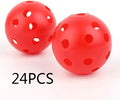 Assortment of red, orange, blue, green, white, and yellow 42mm golf practice balls in a net.