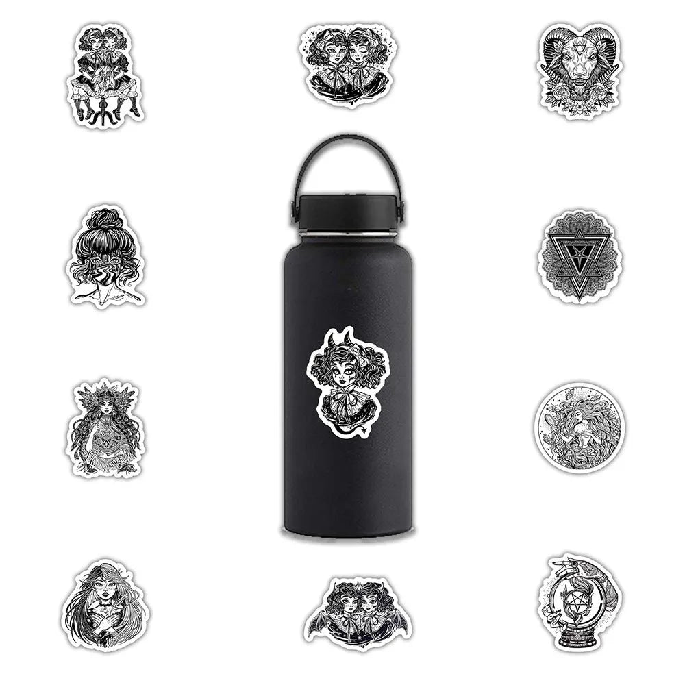 50 black and white gothic graffiti stickers on a table, showing assorted designs on a phone case and laptop