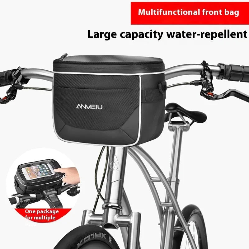 Black folding bicycle handlebar bag with hanging loop, shown attached to bike bars.
