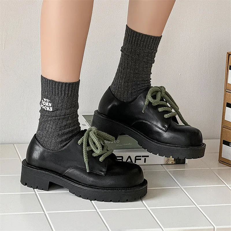 Big Head Derby platform casual shoes in microfiber with a rubber sole for height increase.