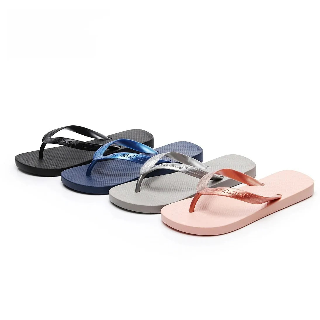Women's flat bottom solid colour breathable PVC slippers in black, blue, and gray